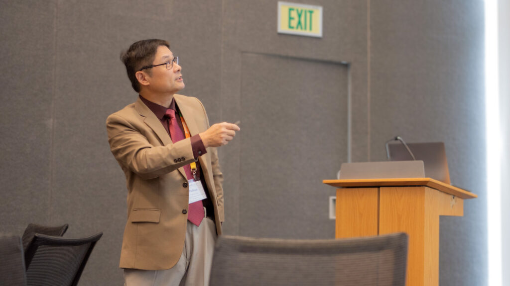 Keynote speaker Peihua Qiu discusses the topic of statistical process control methods for dynamic disease screening.